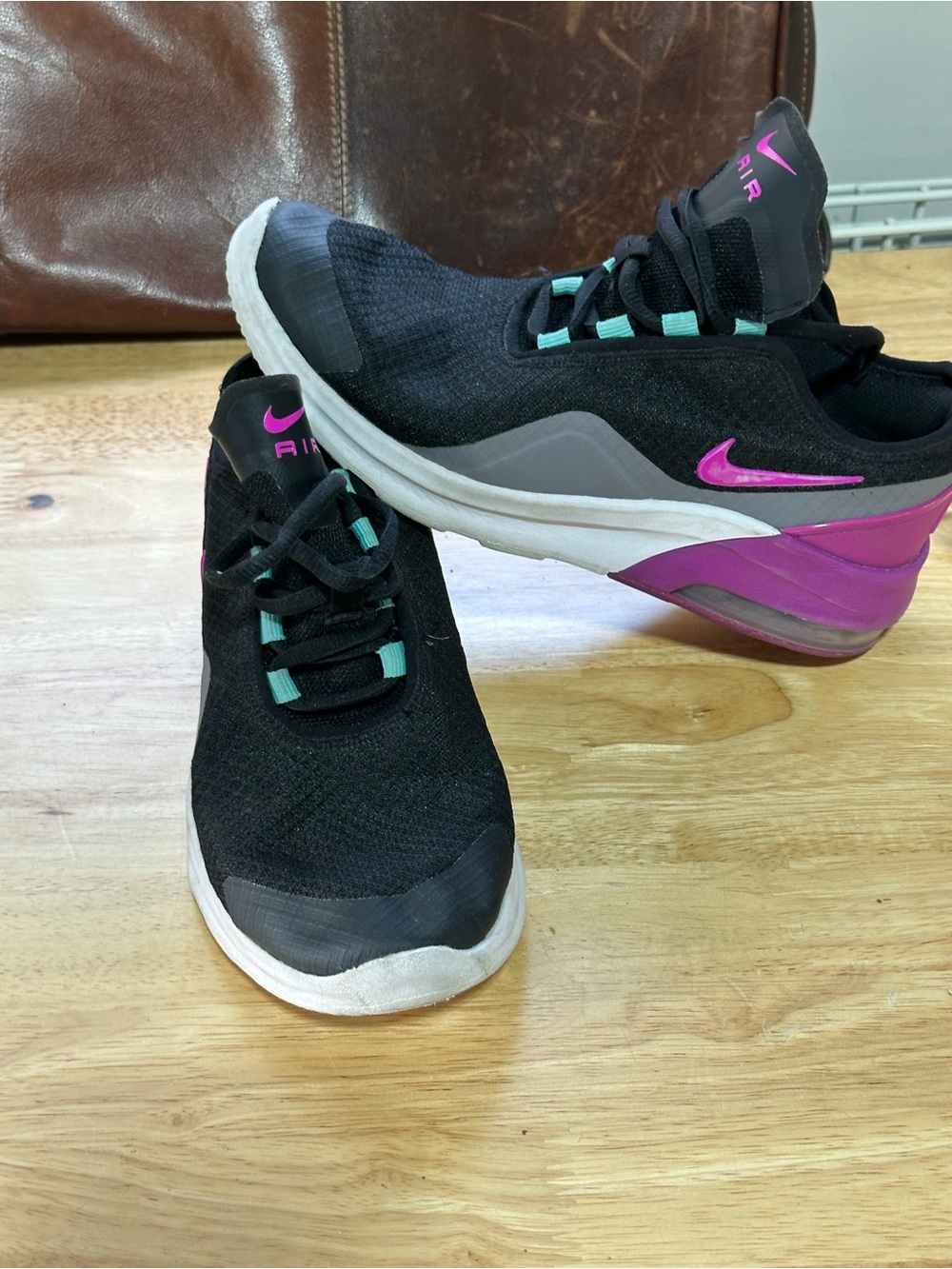 Nike Women's Black Athletic Sneakers with Pink and Teal Accents